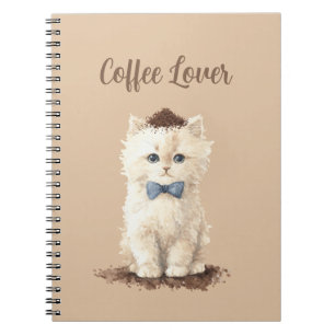 Weiße Katze mit blauem Schleier, die Kaffee liebt Notizblock