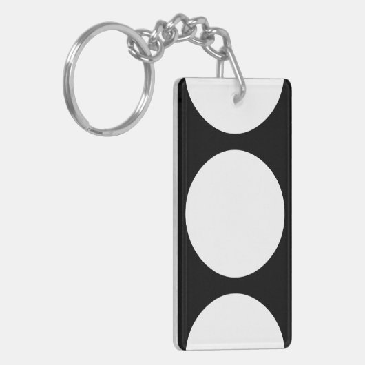 Weiße Kreise auf schwarz Schlüsselanhänger (Vorderseite links)