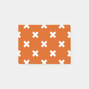 Weiße Kreuzstiche auf verbranntem Orange Post-it Klebezettel