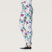 Weiße Leggings mit lebendigen Blumenmustern (Links)