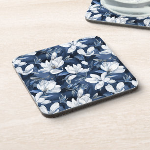 Weiße Magnolia-Blume, blauer Hintergrund Getränkeuntersetzer