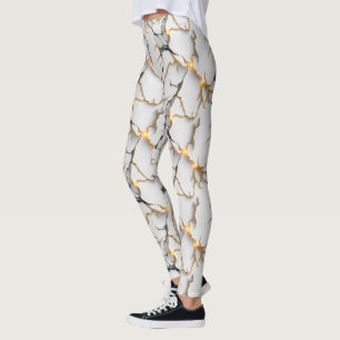Weiße Marmortextur mit leuchtenden goldenen Adern Leggings