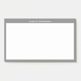 Weiße Monogramm oder Name an der mittelgrauen Gren Post-it Klebezettel