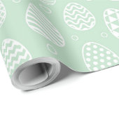 Weiße Ostereier auf grünem Hintergrund Geschenkpapier (Rolleneckpunkt)