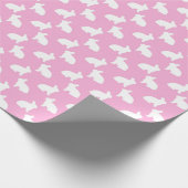 Weiße Osterhasen auf Rosa Geschenkpapier (Ecke)