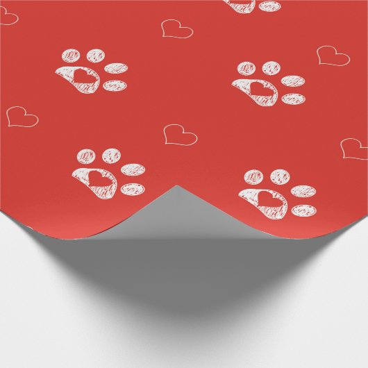 Weiße Pfoten mit rotem Hintergrund Geschenkpapier (Ecke)