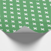 Weiße Polka kreuzt grün Geschenkpapier (Ecke)
