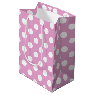 Weiße Polka-Punkte auf hellrosa Mittlere Geschenktüte