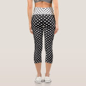 Weiße Polka Punkte auf schwarzem Hintergrund Capri Leggings (Rückseite)