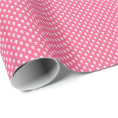 Weiße Schädel auf rosa Packpapier (Rolleneckpunkt)