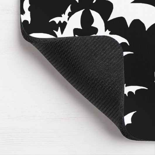 Weiße Schläger auf Schwarzem Mousepad (Ecke)