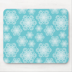 Weiße Schneeflocke auf blau mit Pfotenmuster Mousepad