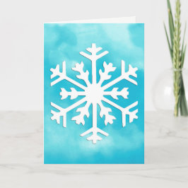 Weiße Schneeflocke auf Blue Watercolor Hintergrund Feiertagskarte