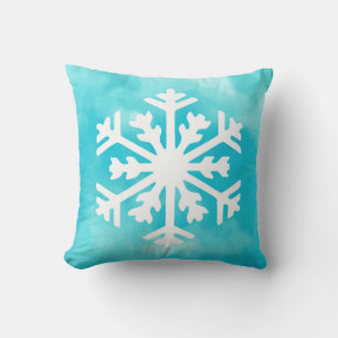 Weiße Schneeflocke auf Blue Watercolor Hintergrund Kissen