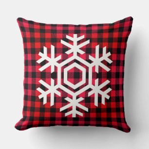 Weiße Schneeflocke auf warmem rotem Tartan-Muster Kissen