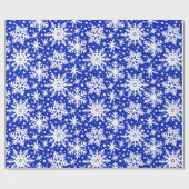 Weiße Schneeflocken auf blau Geschenkpapier (Flach)