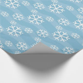 Weiße Schneeflocken auf blau Geschenkpapier (Ecke)