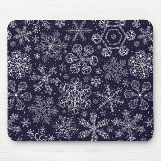 Weiße Schneeflocken auf blau Mousepad (Vorne)