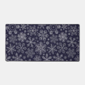 Weiße Schneeflocken auf blau Schreibtischunterlage (Vorderseite)