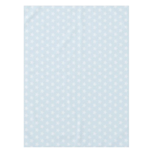 Weiße Schneeflocken auf blauer Tischdecke (Vorderseite)