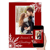 Weiße Schneeflocken auf den Grüßen der Roten Jahre