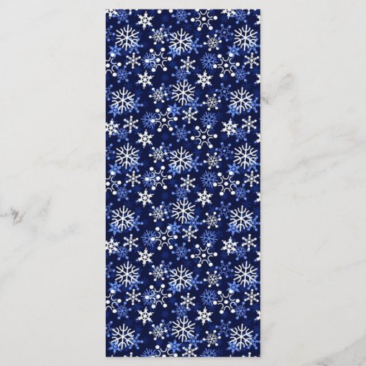 Weiße Schneeflocken auf dunkelblauer Menükarte (Rückseite)
