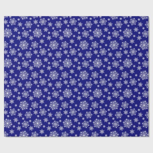Weiße Schneeflocken auf einem Royal Blue Backgroun Geschenkpapier (Flach)