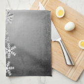 Weiße Schneeflocken auf grauem Küchentuch (Viertel Falte)