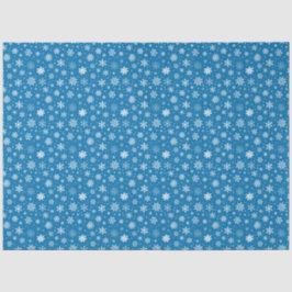 Weiße Schneeflocken auf hellblau Seidenpapier