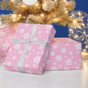 Weiße Schneeflocken auf Hellrosa-Wintermuster Geschenkpapier