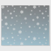Weiße Schneeflocken auf silbernem Blau Geschenkpapier (Flach)