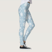 Weiße Schneeflocken im hellblauen Hintergrund Wint Leggings (Rechts)