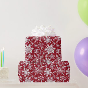 Weiße Schneeflocken in Rot Geschenkpapier