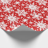 Weiße Schneeflocken in Rot Geschenkpapier (Ecke)