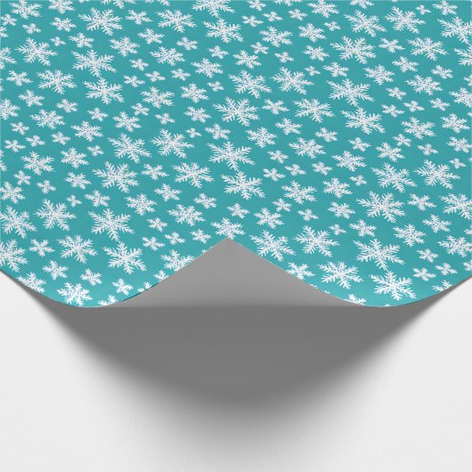 weiße Schneeflocken mit blauem Hintergrund Wrappin Geschenkpapier (Ecke)