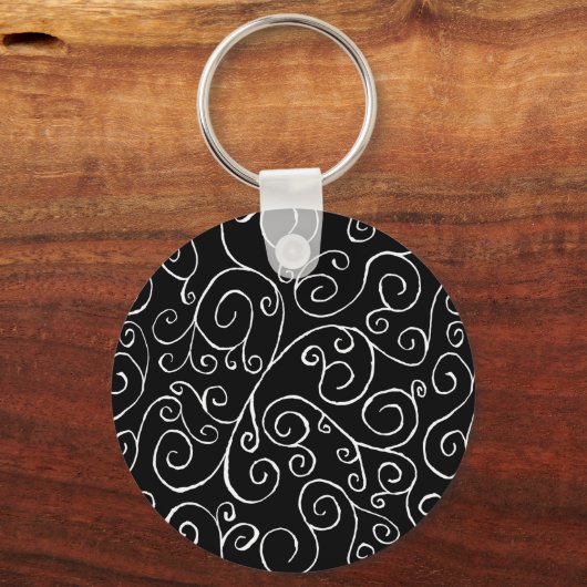 Weiße Scrollbahnen auf schwarz Schlüsselanhänger (Vorderseite)
