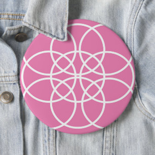 Weiße Spiralkreise auf rosa Button