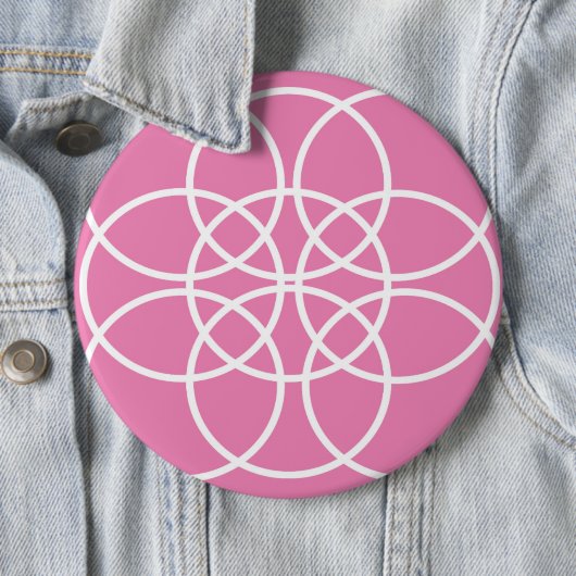 Weiße Spiralkreise auf rosa Button (Beispiel)