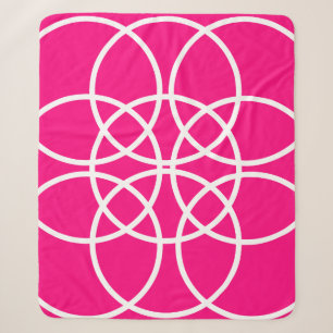 Weiße Spiralkreise auf rosa Sherpadecke