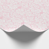 Weiße Spitze auf rosa Geschenkpapier (Ecke)
