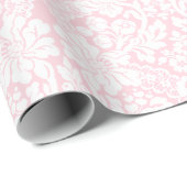 Weiße Spitze auf rosa Geschenkpapier (Rolleneckpunkt)