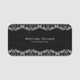 Weiße Spitze auf schwarz Namensschild