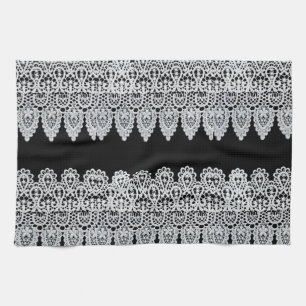 Weiße Spitze bildet eine empfindliche Grenze gege Geschirrtuch