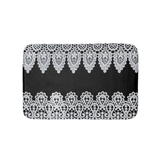 Weiße Spitze bildet eine empfindliche Grenze gegen Badematte (Vorderseite)