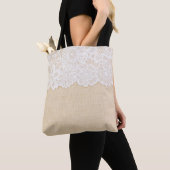 Weiße Spitzen über Stoffdesign. Tasche (Von Nahem)