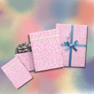 Weiße Sprinklen im rosa Hintergrund Geschenkpapier