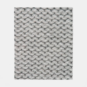 Weiße Strickwollestruktur, nahes Foto. Fleecedecke