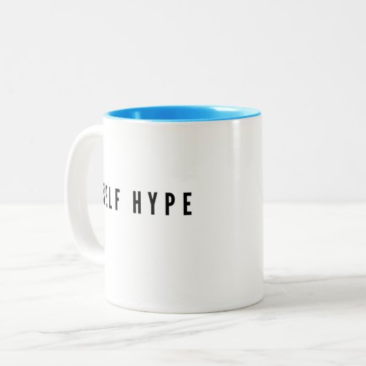 Weiße Tasse mit Black #SelfHype Lettering (Vorderseite Links)