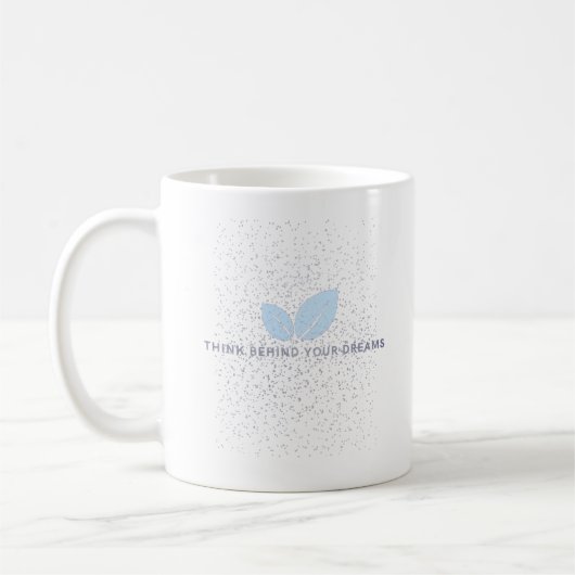 Weiße Tasse mit blauem Leaf-Design und Zitat (Links)