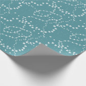 Weiße Tierspuren auf Türkis Geschenkpapier (Ecke)